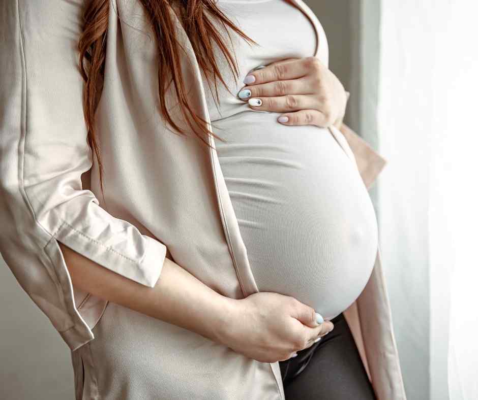 Pregnant woman smiling